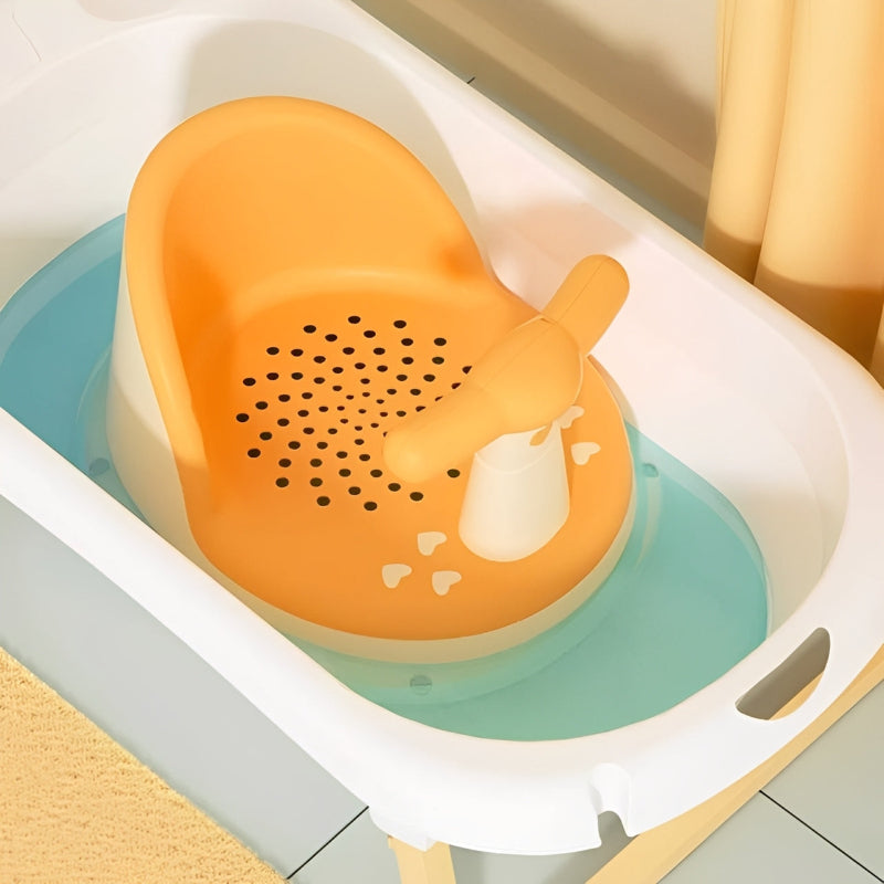 Orange duck-shaped bath toy in a bathtub with water