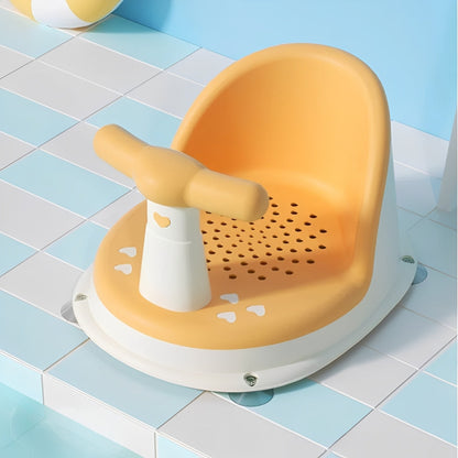 Yellow bath seat with handle on a tiled bathroom floor