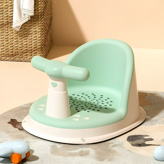Children's training seat with a heart design on a beige floor.