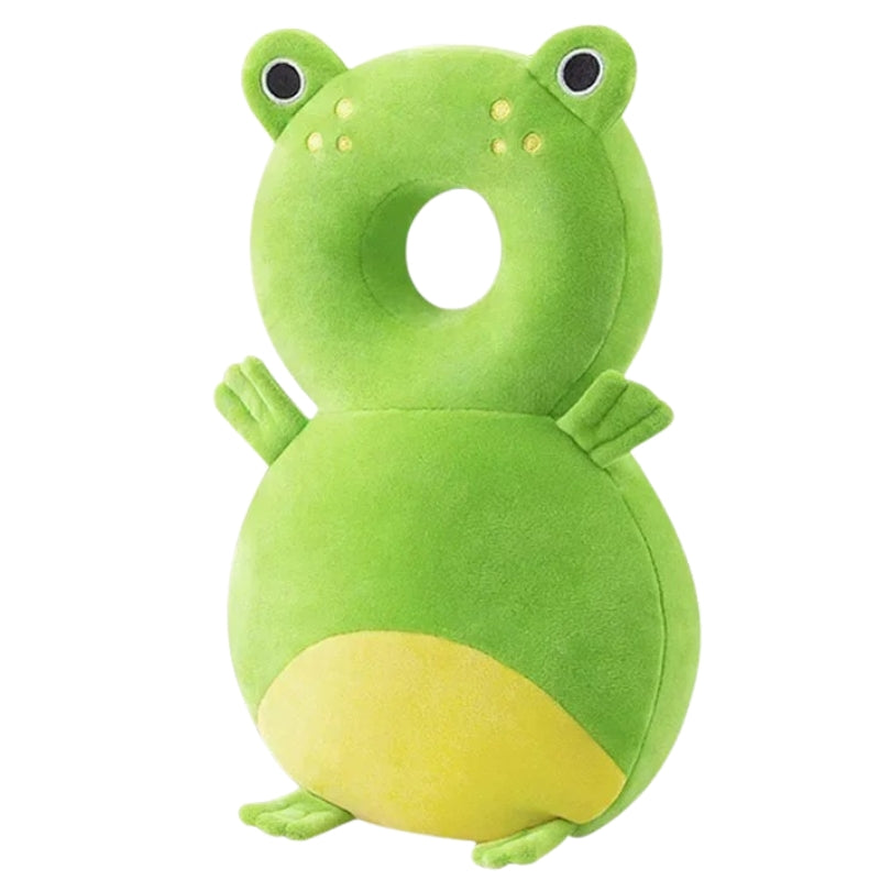 Green frog-shaped pillow on a white background