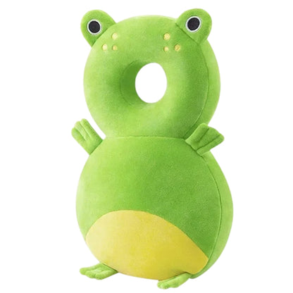Green frog-shaped pillow on a white background