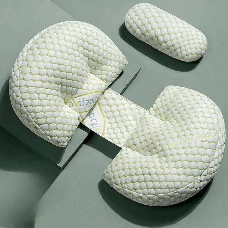 Three white honeycomb-patterned pillows on a gray background